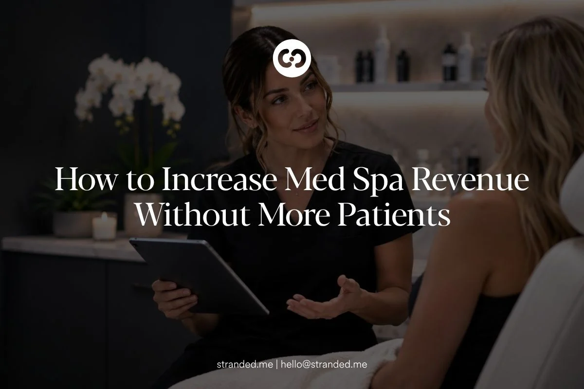 Aesthetic provider discussing a personalized treatment plan with a patient inside a modern med spa.