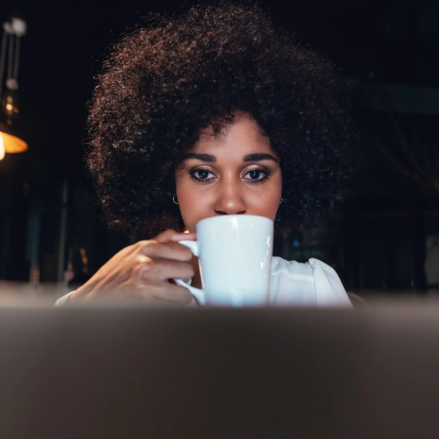 Hair salon client discovering services and styles online