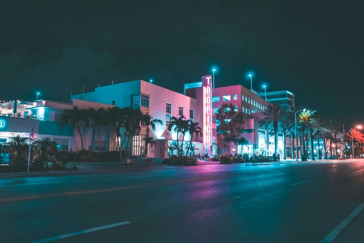 Miami art deco buildings lit at night for plastic surgery marketing
