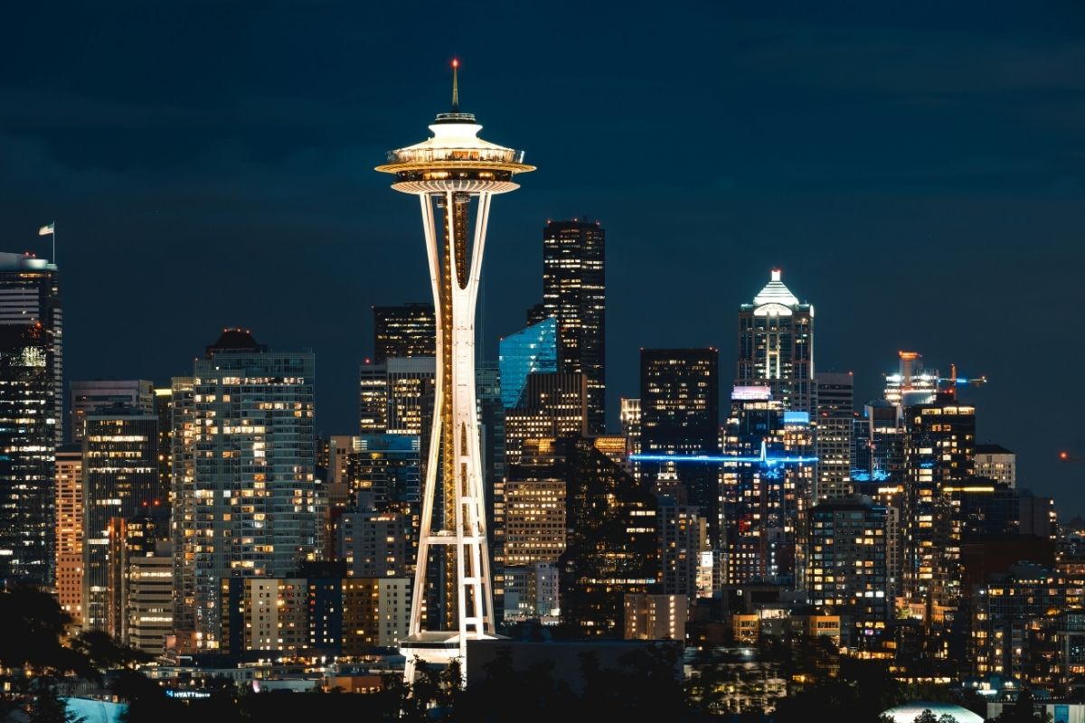 Seattle skyline with the Space Needle at night for plastic surgery marketing